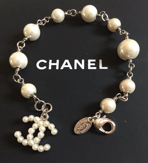 silver chanel charm|authentic Chanel charm bracelets.